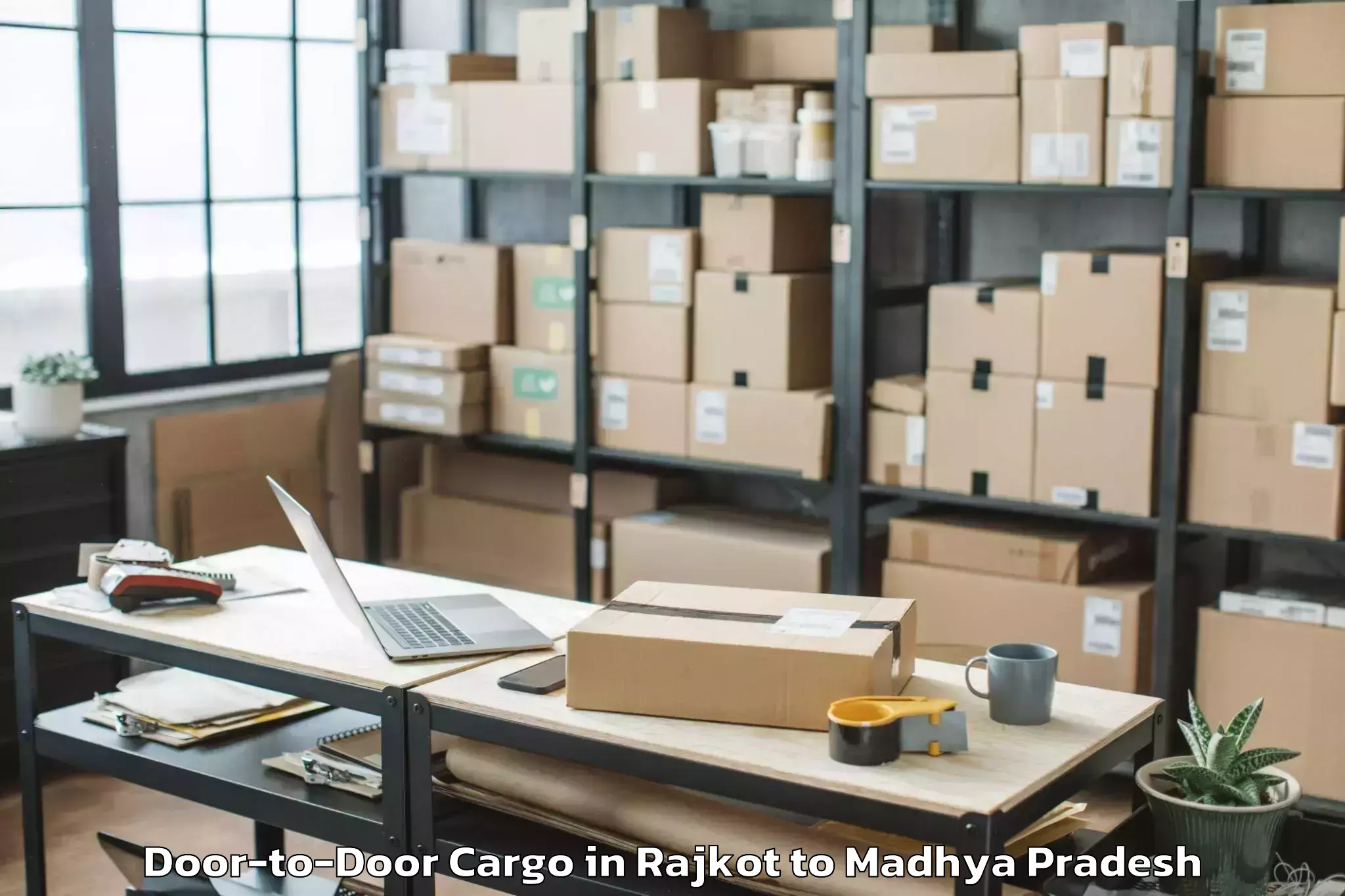 Hassle-Free Rajkot to Dhamnod Door To Door Cargo